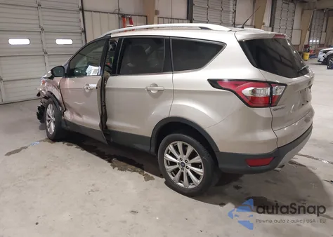 2017 Ford Escape Titanium z USA, uszkodzony, nr VIN 1FMCU0J92HUD90761